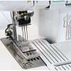 , , Sturdy Metal Frame, 1,100 Stitches Per Minute, Trim Trap, Included Snap on Presser Feet 3