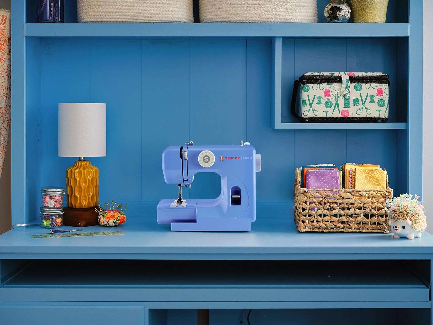 SINGER M1000 Lightweight & Portable Sewing Machine With 32 Stitch Applications, LED Light & Top drop-in bobbin for Hems - Great for Mending - Blue - 7