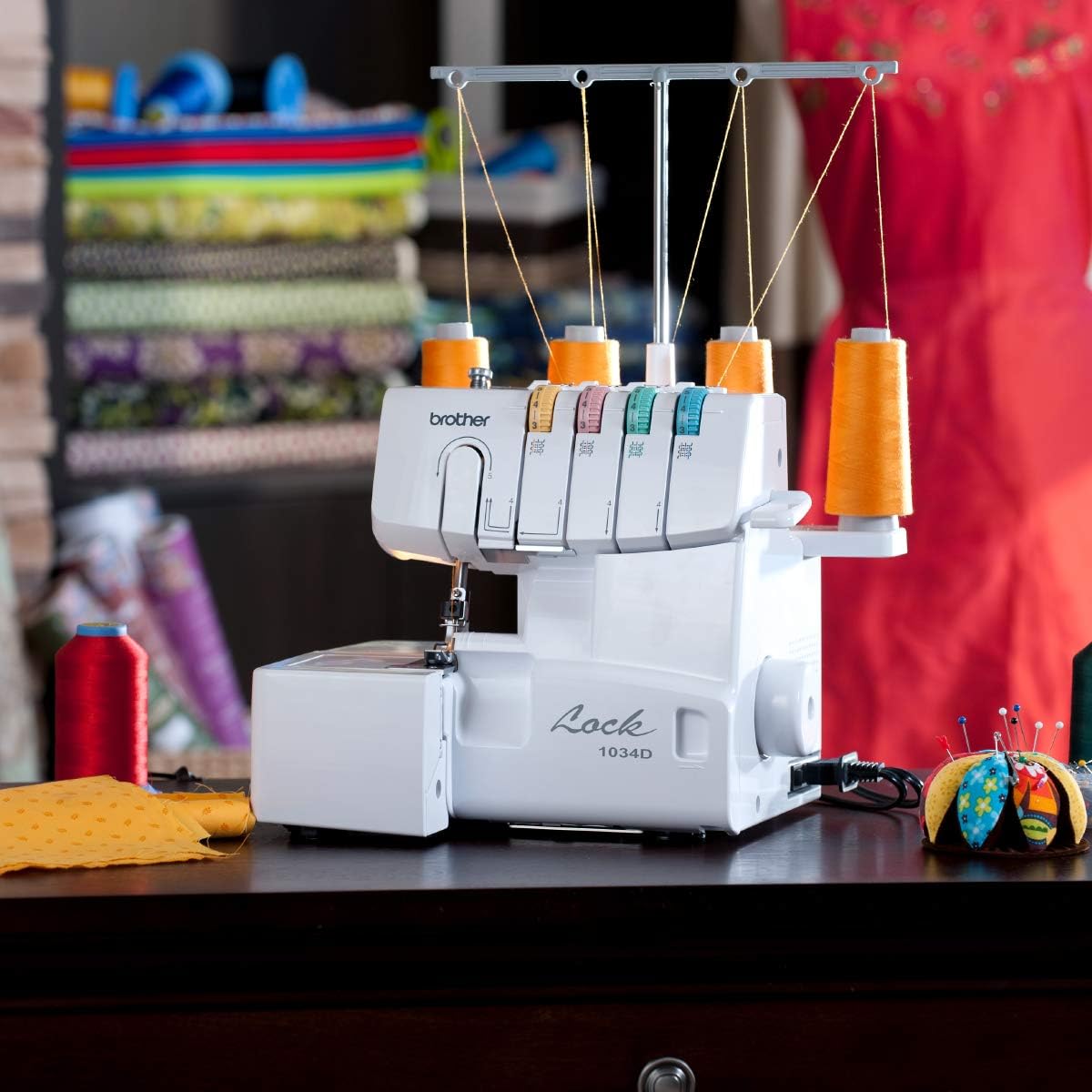 Brother Serger, 1034D, Heavy-Duty Metal Frame Overlock Machine, 1,300 Stitches Per Minute, Removeable Trim Trap, 3 Included Accessory Feet, White - Image 2